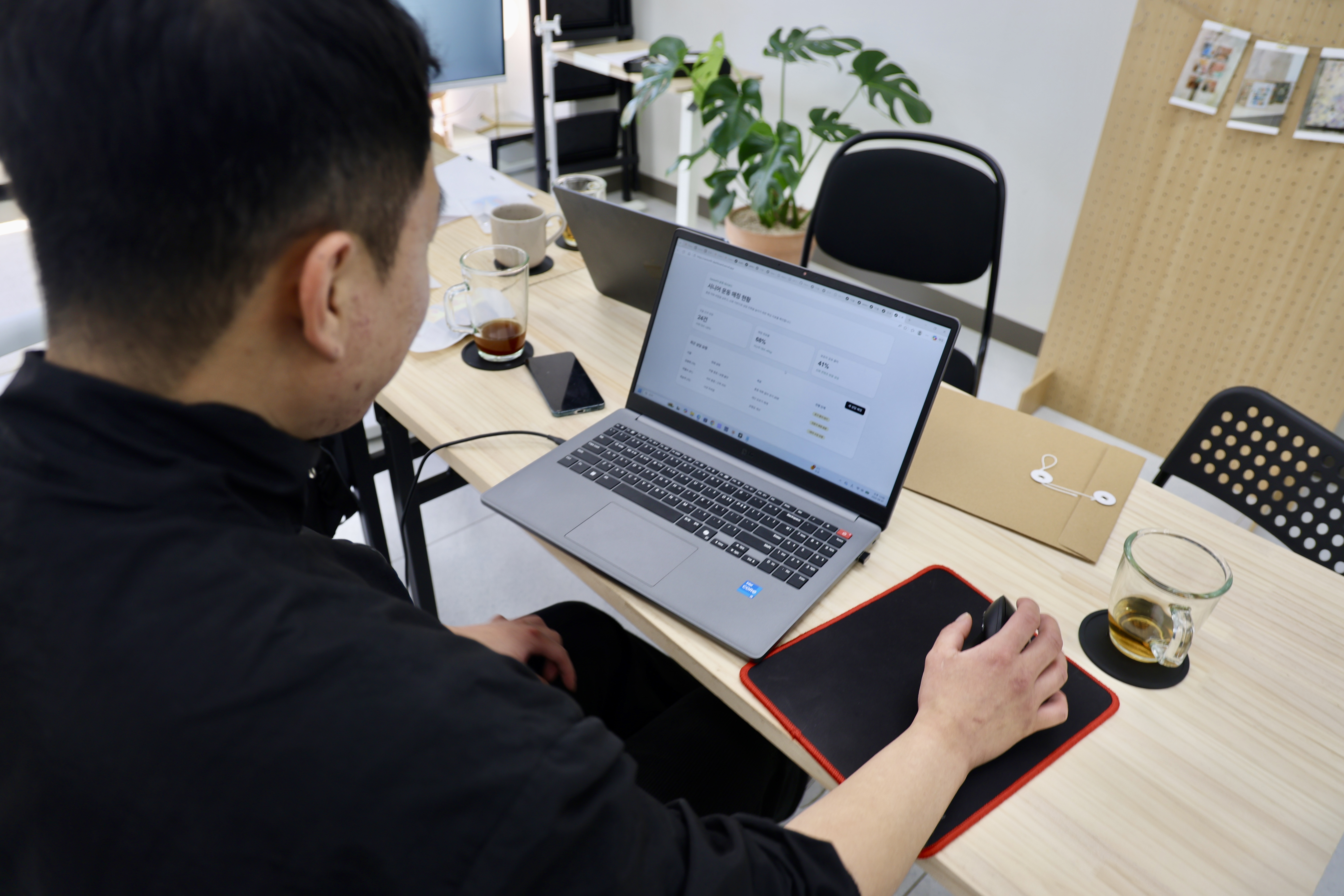 Solopreneur workshop — reviewing strategy on screen