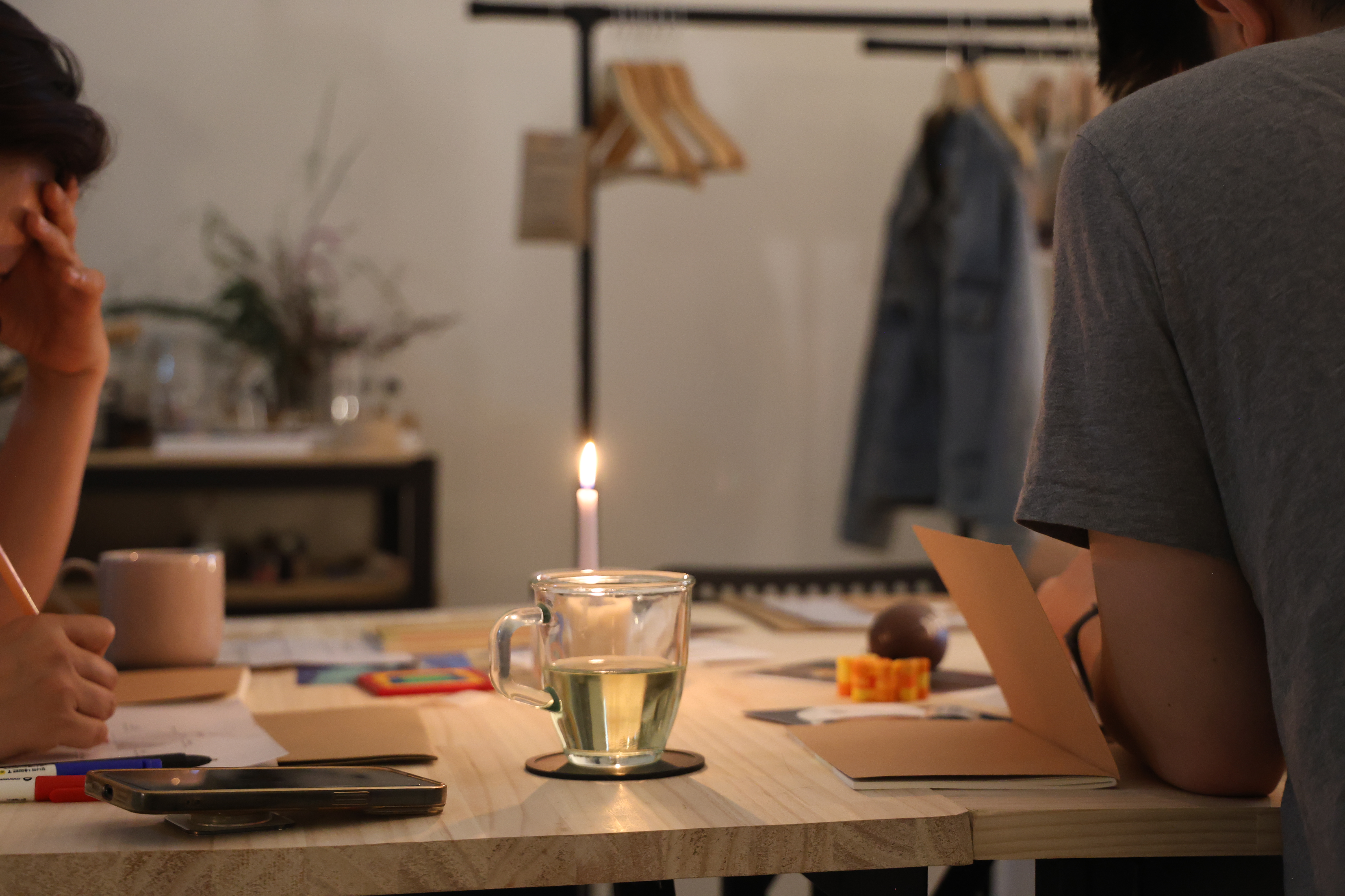 Workshop table — Wheel of Life worksheets and candles