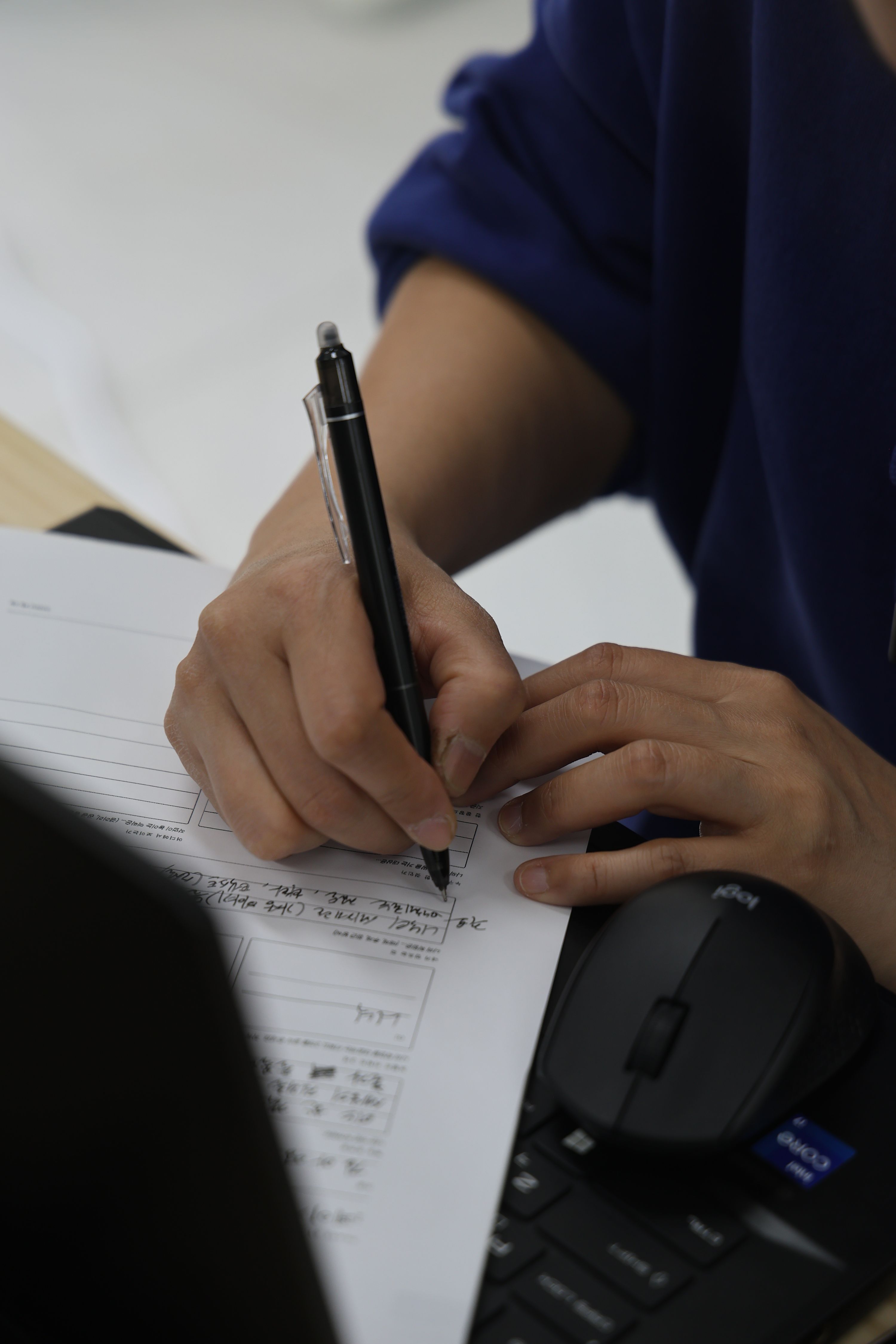Sketching out a Work-Asset Report by hand