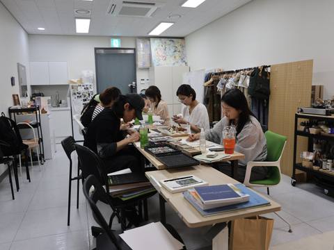 Participants drawing at the studio tables — Material Lab × AI Archiving, July 8, 2026