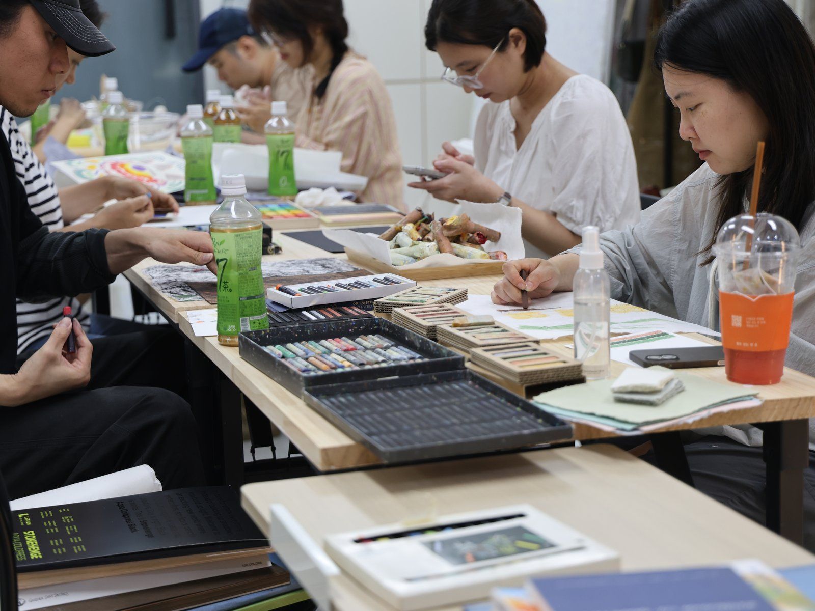 Participants working with handmade pastels — Material Lab × AI Archiving, July 8, 2026