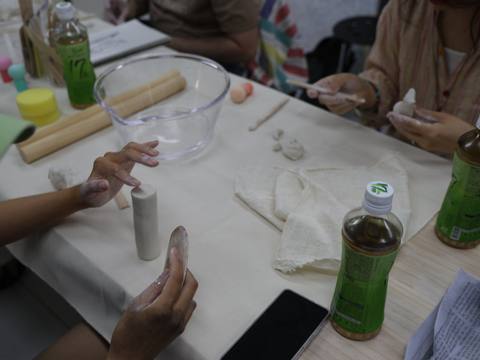Hands shaping clay — Material Lab × AI Archiving, July 8, 2026