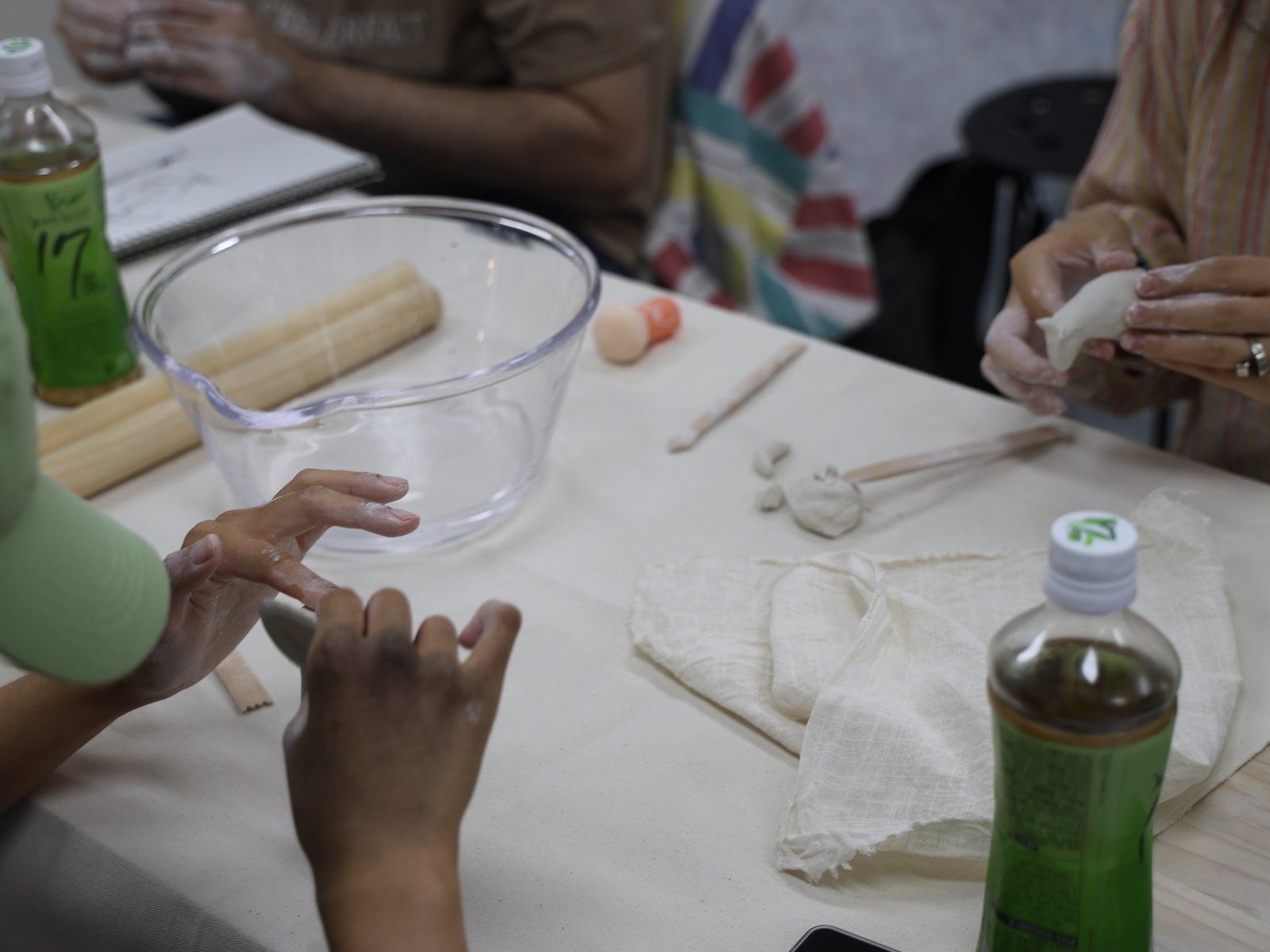 Hands working with clay — Material Lab × AI Archiving, July 8, 2026