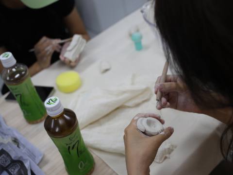 Carving details into clay — Material Lab × AI Archiving, July 8, 2026