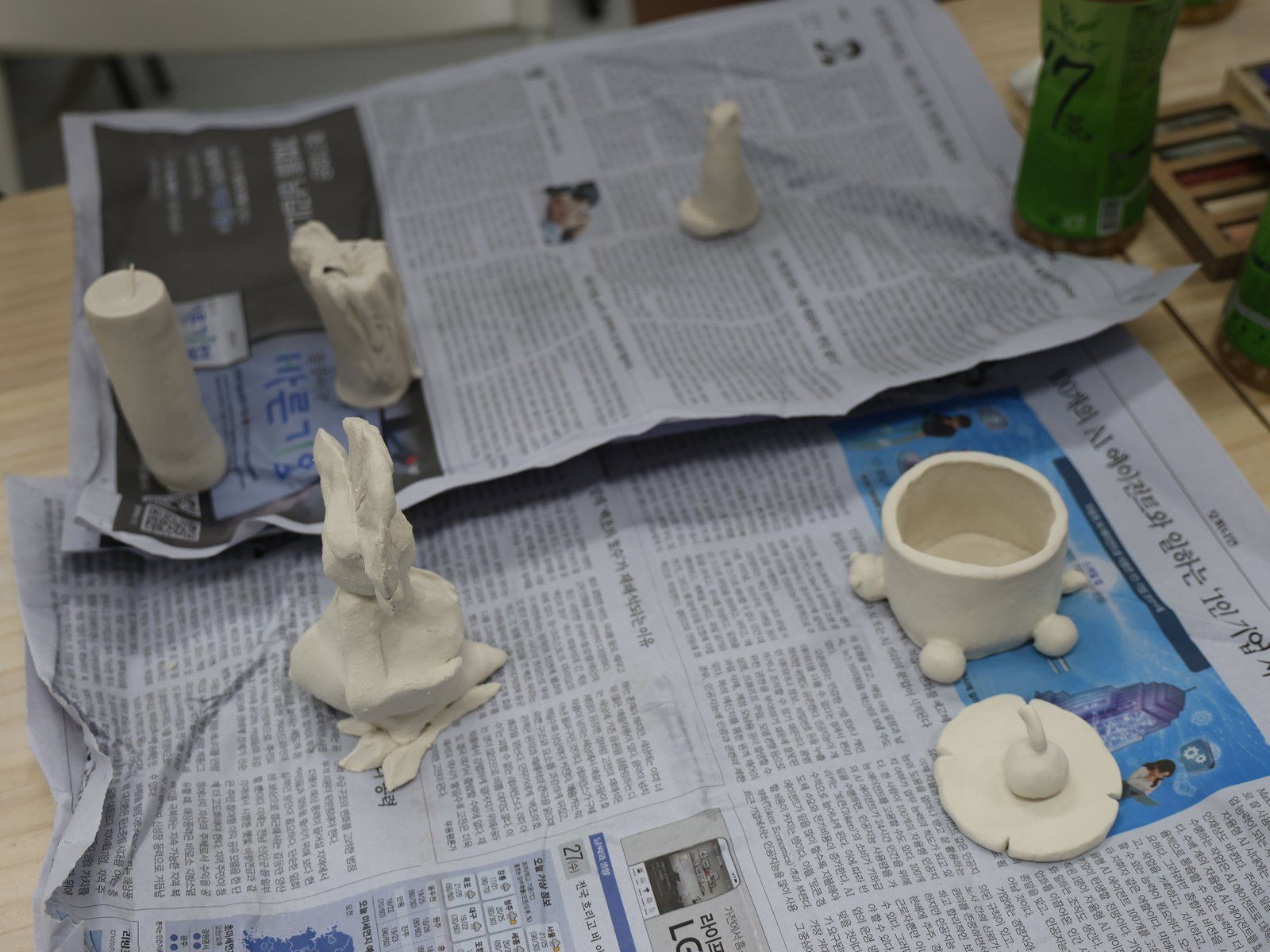 Ceramic objects lined up to dry — Material Lab × AI Archiving, July 8, 2026