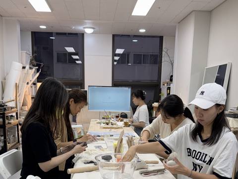 The clay session with participants at work — Material Lab × AI Archiving, July 15, 2026