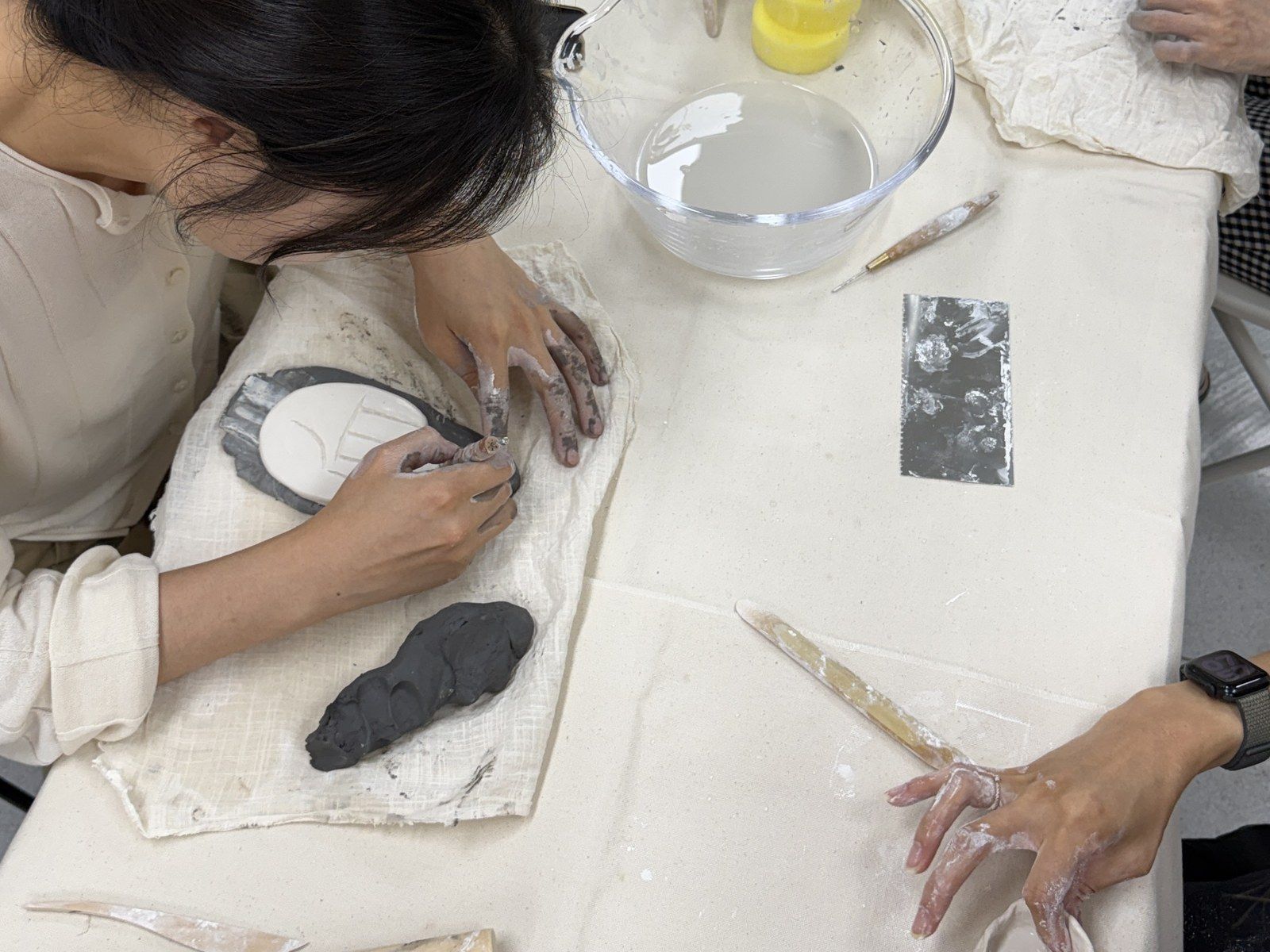 Rolling and shaping clay by hand — Material Lab × AI Archiving, July 15, 2026