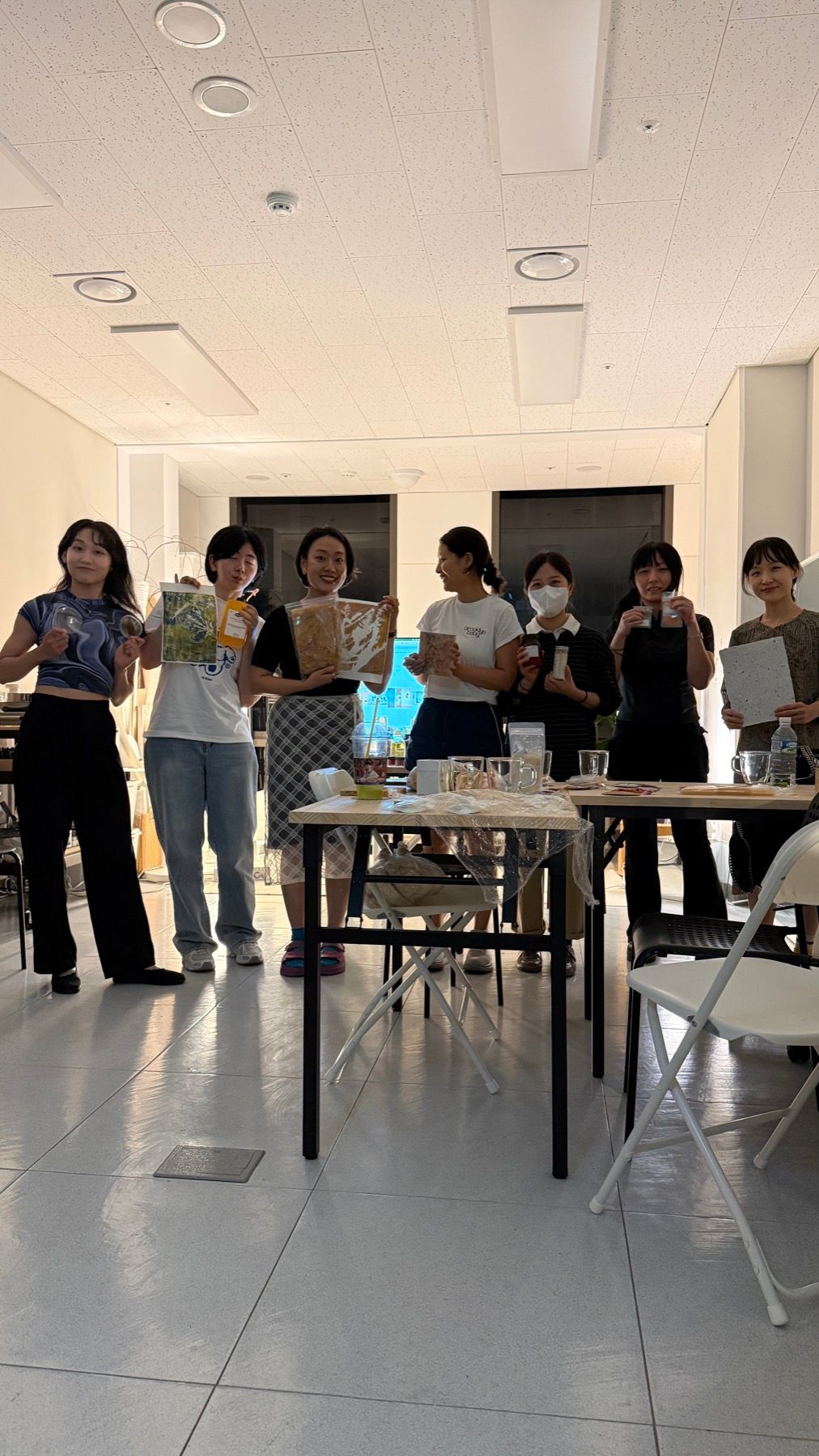 The Organic Material Wave team gathered around the material collection — June 26, 2026