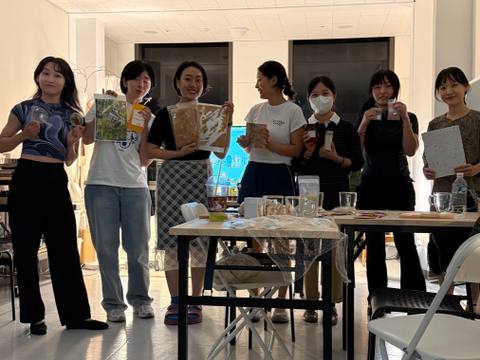 The Organic Material Wave team gathered around the material collection — June 26, 2026